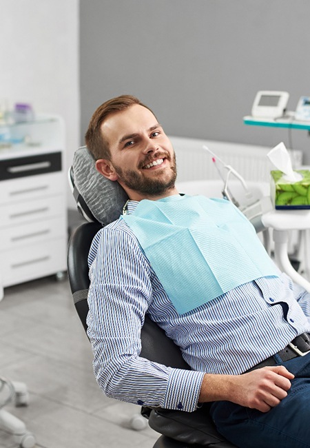 Person sitting in a dental chair